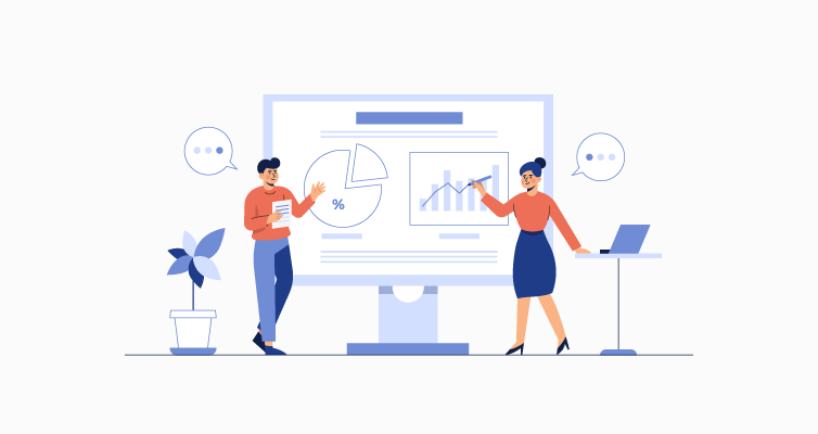 hai nhân viên đang trao đổi phân tích báo cáo tài chính