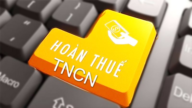 bàn phím có nút enter màu vàng ghi chữ hoàn thuế