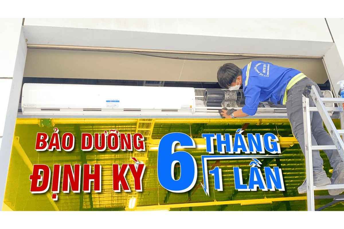 Nhân viên MECI đang bảo dưỡng định kỳ quạt cắt gió, kế bên là chữ bảo dưỡng định kỳ 6 tháng/1 lần