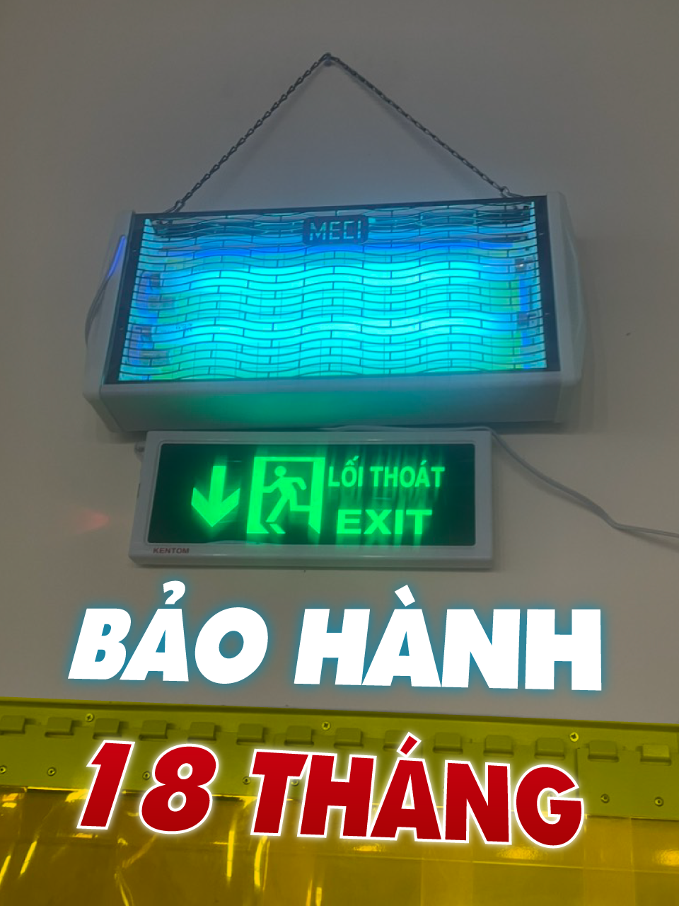 đèn diệt côn trùng đang được treo lên và có text 18 tháng bảo hành